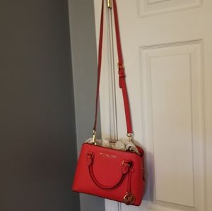 Orange Michael Kors cross body purse